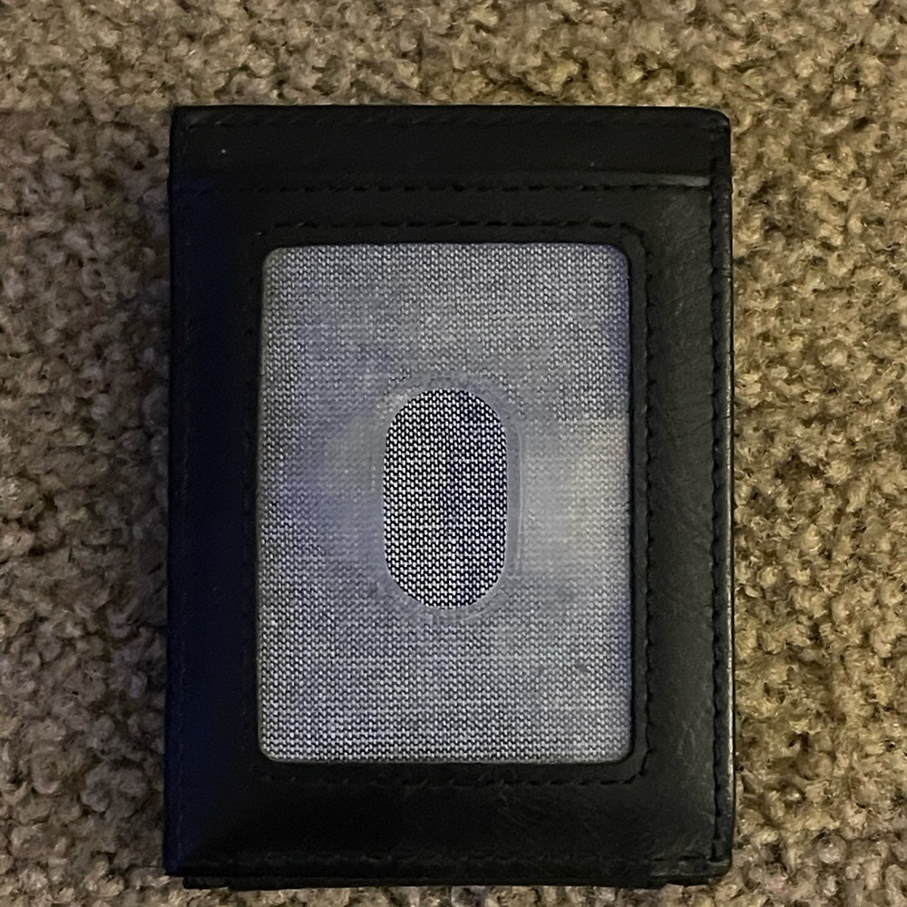 In good condition simple wallet with money clip